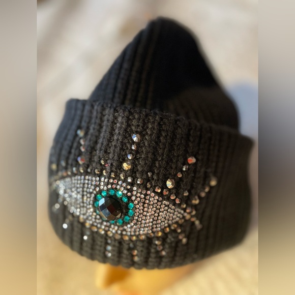 Black Beanie with Eye Design by Kurt Geiger.
NWOT - Picture 16 of 17